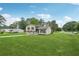 Lovely home showcasing a lush front yard, inviting pathway, and a serene suburban setting at 1915 North Rd, Snellville, GA 30078