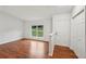 Inviting living room features hardwood floors, fresh paint, and ample natural light at 1915 North Rd, Snellville, GA 30078