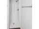 Modern shower features a shower head and grab bar at 1915 North Rd, Snellville, GA 30078