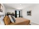Bedroom featuring neutral walls, carpeted floors, a comfortable bed, and lots of natural light at 3038 Manor Hill Pl, Union City, GA 30291