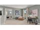 Bright bonus room featuring neutral walls, stylish decor, work space, and lots of natural light at 3038 Manor Hill Pl, Union City, GA 30291