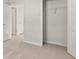 Bright bedroom with neutral carpet and a spacious walk-in closet at 3040 Manor Hill Pl, Union City, GA 30291