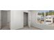 Cozy bedroom with plush carpeting, a closet, and a view to the neighborhood at 3042 Manor Hill Pl, Union City, GA 30291
