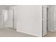 Bedroom featuring neutral carpeting and open doors leading to other rooms at 3042 Manor Hill Pl, Union City, GA 30291