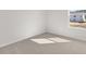 Bedroom with plush carpeting and natural light streaming through the window at 3042 Manor Hill Pl, Union City, GA 30291