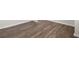 Close-up showcasing the luxury vinyl plank flooring with white trim and neutral decor at 3042 Manor Hill Pl, Union City, GA 30291