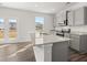 Modern kitchen featuring stainless steel appliances, granite countertops, and a breakfast bar at 3042 Manor Hill Pl, Union City, GA 30291