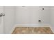 The laundry room features vinyl flooring and modern hookups at 3042 Manor Hill Pl, Union City, GA 30291