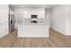 Modern kitchen with stainless steel appliances, white cabinets, granite countertops, and center island at 3044 Manor Hill Pl, Union City, GA 30291