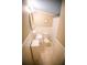 A narrow bathroom features tile floor, toilet, vanity, and shower at 329 Kelly Mill Rd, Cumming, GA 30040