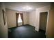 A small bedroom features carpet, one window and neutral paint at 329 Kelly Mill Rd, Cumming, GA 30040