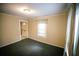 This room has a window and carpeting at 329 Kelly Mill Rd, Cumming, GA 30040