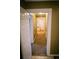 Hallway with doorway and a view of kitchen at 329 Kelly Mill Rd, Cumming, GA 30040