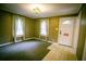 Inviting living room features neutral carpet, ample natural light, and a welcoming atmosphere at 329 Kelly Mill Rd, Cumming, GA 30040