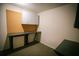 This work room features storage and desk at 329 Kelly Mill Rd, Cumming, GA 30040