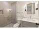 Contemporary bathroom showcasing glass shower, marble countertop vanity, and modern fixtures, offering a spa-like experience at 4132 Carmain Ne Dr, Atlanta, GA 30342