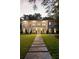 Stately home with manicured lawn and inviting stone walkway; perfect curb appeal at 4132 Carmain Ne Dr, Atlanta, GA 30342
