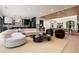 Expansive living space with modern design, chef's kitchen, and a cozy seating area at 4132 Carmain Ne Dr, Atlanta, GA 30342