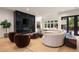 Bright living room with fireplace, modern furnishings, and view of the outdoors at 4132 Carmain Ne Dr, Atlanta, GA 30342