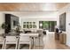 Bright, open concept living space boasts hardwood floors and a seamless transition to outdoor patio at 4132 Carmain Ne Dr, Atlanta, GA 30342