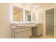 Stylish bathroom with double sinks, granite countertops and a separate vanity area at 250 Crabapple Rd, Mcdonough, GA 30253