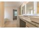 Bright bathroom featuring double vanity with granite countertops and modern fixtures at 250 Crabapple Rd, Mcdonough, GA 30253