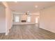 Spacious living area with hard surface floors, fireplace and recessed lighting at 250 Crabapple Rd, Mcdonough, GA 30253