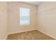 Bright walk-in closet with window and shelving at 250 Crabapple Rd, Mcdonough, GA 30253