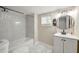 Updated bathroom features a shower/tub combo, and marble-look tile at 2794 7Th Sw St, Atlanta, GA 30315