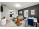 Bright living room features modern furnishings, colorful rug and decor, and open access to the kitchen at 2794 7Th Sw St, Atlanta, GA 30315