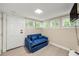 Bonus room with lots of natural light offers space to relax or entertain with a pull out sofa at 2794 7Th Sw St, Atlanta, GA 30315