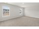 Spacious bedroom features plush carpet and large windows for natural light, creating a serene atmosphere at 3048 Manor Hill Pl, Union City, GA 30291