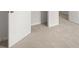 Cozy bedroom with plush carpet and a partially opened door at 3048 Manor Hill Pl, Union City, GA 30291