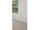 Carpeted bedroom featuring a window providing natural light at 3048 Manor Hill Pl, Union City, GA 30291