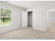 Spacious bedroom with natural light and a walk-in closet for storage at 3048 Manor Hill Pl, Union City, GA 30291