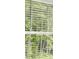 View of the outdoors visible through a window with horizontal blinds at 3048 Manor Hill Pl, Union City, GA 30291