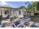 Inviting back deck with outdoor furniture, perfect for enjoying the professionally landscaped backyard at 139 Sisson Ne Ave, Atlanta, GA 30317