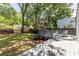 A backyard featuring a spacious deck area and a professionally landscaped green lawn at 139 Sisson Ne Ave, Atlanta, GA 30317