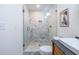 Sleek bathroom with glass enclosed shower, and modern toilet and sink at 139 Sisson Ne Ave, Atlanta, GA 30317