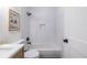 Neat bathroom with a shower-tub combination and a modern toilet and sink at 139 Sisson Ne Ave, Atlanta, GA 30317