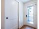 Welcoming entryway with hardwood floors, a closet and a glass door to the backyard at 139 Sisson Ne Ave, Atlanta, GA 30317