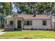 Charming single-story home featuring a covered front porch, well-maintained lawn, and classic curb appeal at 139 Sisson Ne Ave, Atlanta, GA 30317