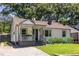 Charming bungalow featuring a cozy front porch, landscaped garden, and classic architectural details at 139 Sisson Ne Ave, Atlanta, GA 30317