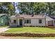 Charming home with a well-manicured front yard and inviting curb appeal at 139 Sisson Ne Ave, Atlanta, GA 30317
