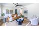 Open living room with comfortable seating, hardwood floors, and an arched entryway at 139 Sisson Ne Ave, Atlanta, GA 30317