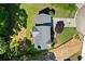 Aerial view displays the house, roof, and landscaping from above at 1661 Duxbury Nw Ln, Kennesaw, GA 30152