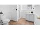 Bathroom with a walk-in shower, vanity, and tiled floors at 1661 Duxbury Nw Ln, Kennesaw, GA 30152