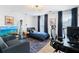 Bedroom with desk, chair, and media for entertainment at 1661 Duxbury Nw Ln, Kennesaw, GA 30152