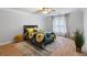 Bedroom with a colorful quilt and a ceiling fan at 1661 Duxbury Nw Ln, Kennesaw, GA 30152