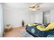 Spacious bedroom featuring natural light and wood floors at 1661 Duxbury Nw Ln, Kennesaw, GA 30152